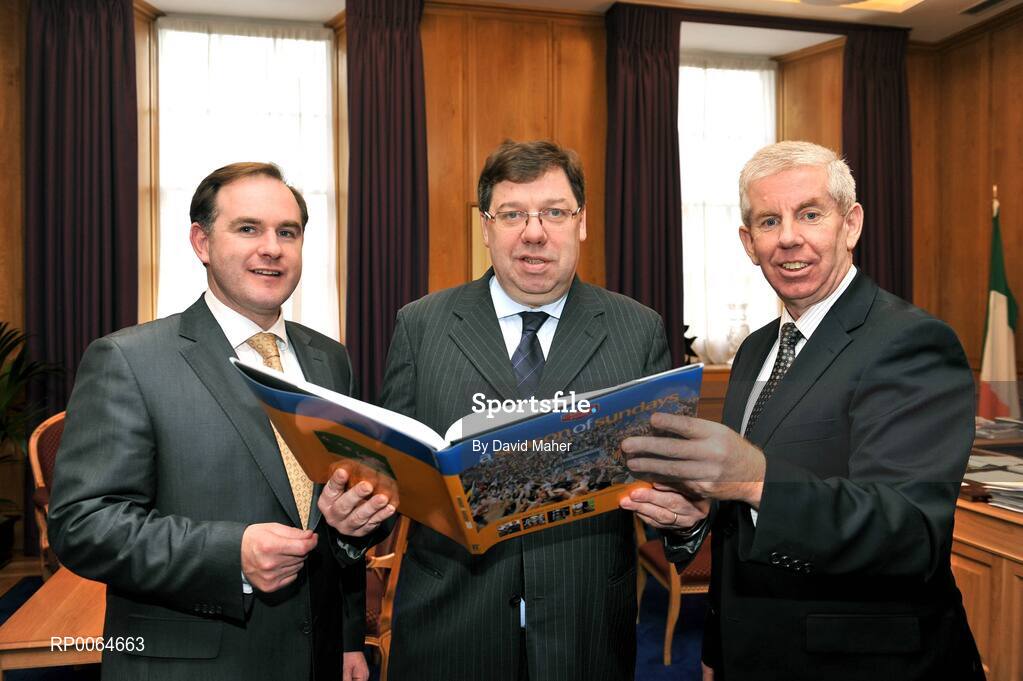 2 December 2008; Sportsfile photographer Ray McManus, right, and Alan Gilson, Commercial Director, Carroll Cusine, present a copy of A Season of Sundays 2008 to An Taoiseach Brian Cowen T.D. The 12th edition of the book is now available at all good book shops at €34:95. Government Buildings, Leinster House, Dublin. Picture credit: David Maher  / SPORTSFILE