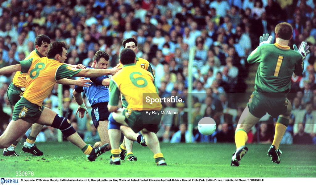 20 September 1992; Vinny Murphy of Dublin has his shot saved by Donegal goalkeeper Gary Walsh during the All Ireland Senior Football Championship Final match between Dublin and Donegal at Croke Park, Dublin. Photo by Ray McManus/Sportsfile