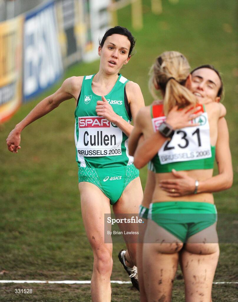 14 December 2008; Ireland's Mary Cullen crosses the line to finish 4th in the Senior Women's event, as 2nd place Portugal's Jessica Augusto (231) celebrates with team-mate and 3rd place Ines Monteiro, during the 2008 European Cross Country Championships. Parc de Laeken, Brussels, Belgium. Picture credit: Brian Lawless / SPORTSFILE