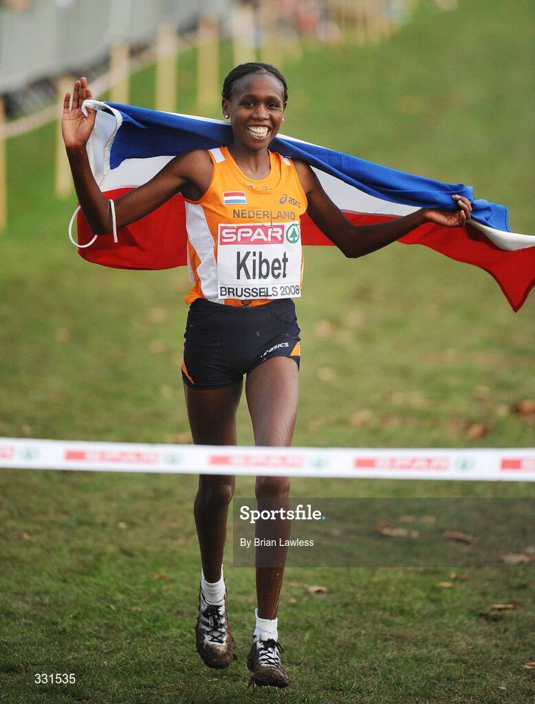 14 December 2008; Hilda Kibet of the Netherlands celebrates as she crosses the finish line to win the Senior Women's event during the 2008 European Cross Country Championships. Parc de Laeken, Brussels, Belgium. Picture credit: Brian Lawless / SPORTSFILE