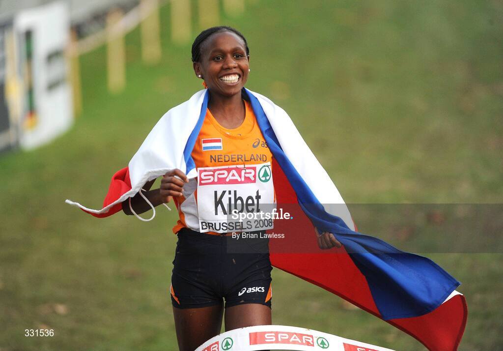 14 December 2008; Hilda Kibet of the Netherlands celebrates as she crosses the finish line to win the Senior Women's event during the 2008 European Cross Country Championships. Parc de Laeken, Brussels, Belgium. Picture credit: Brian Lawless / SPORTSFILE