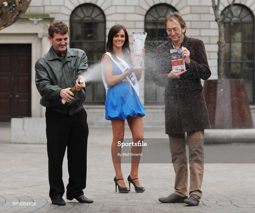11 December 2008; Crashed and Byrned by former motorsport driver Tommy Byrne with Mark Hughes has today been named the William Hill Irish Sports Book of the Year for 2008. Pictured is Tommy Byrne with Mark Hughes, Author and model Julie Devine following the presentation. William Hill Bookmakers, Dame Street, Dublin. Picture credit: Matt Browne / SPORTSFILE