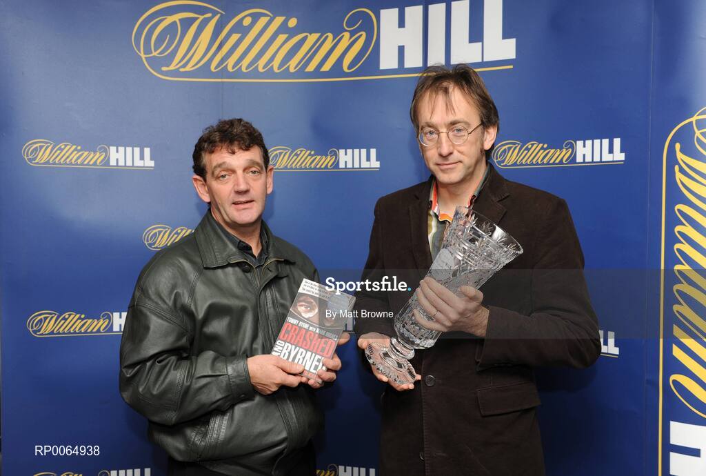 11 December 2008; Crashed and Byrned by former motorsport driver Tommy Byrne with Mark Hughes has today been named the William Hill Irish Sports Book of the Year for 2008. Pictured is Tommy Byrne and Author, Mark Hughes at the presentation. William Hill Bookmakers, Dame Street, Dublin. Picture credit: Matt Browne / SPORTSFILE