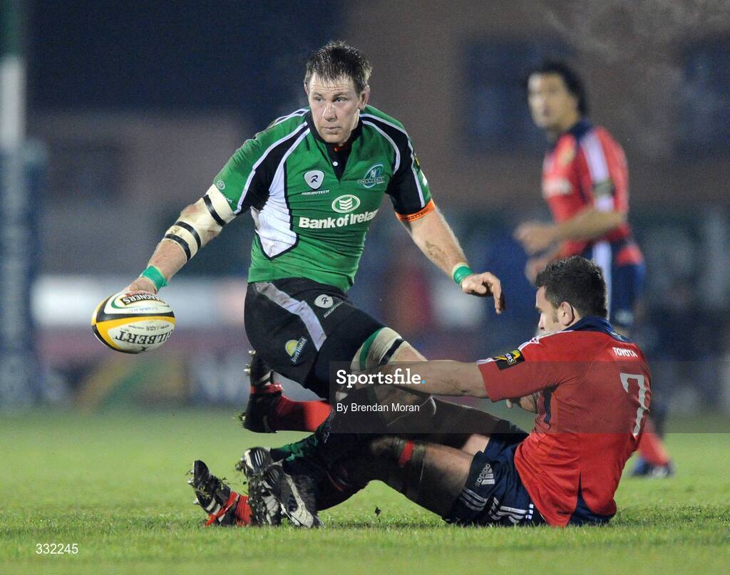 28 December 2008; Colm Rigney, Connacht, is tackled by Niall Ronan, Munster. Magners League, Connacht v Munster, Sportsground, Galway. Picture credit: Brendan Moran / SPORTSFILE