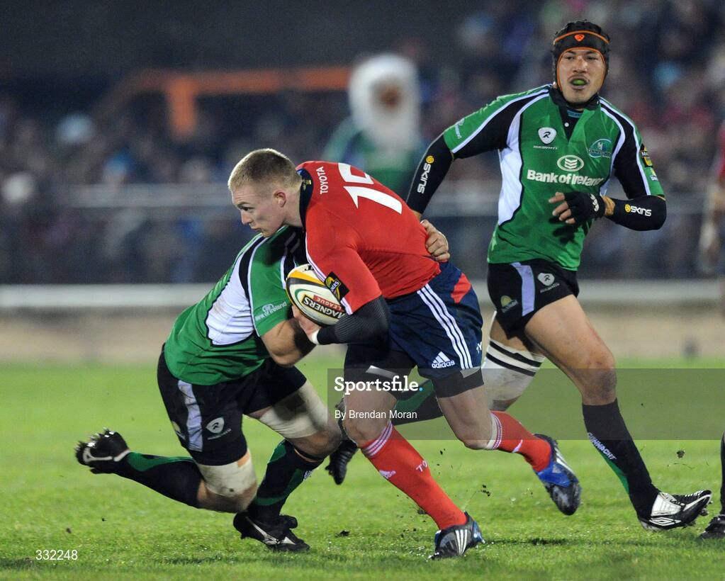 28 December 2008; Keith Earls, Munster, is tackled by John Muldoon, Connacht. Magners League, Connacht v Munster, Sportsground, Galway. Picture credit: Brendan Moran / SPORTSFILE