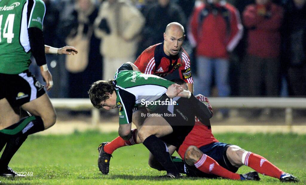 28 December 2008; Ian Keatley, Connacht, is tackled by Keith Earls and Peter Stringer, Munster. Magners League, Connacht v Munster, Sportsground, Galway. Picture credit: Brendan Moran / SPORTSFILE