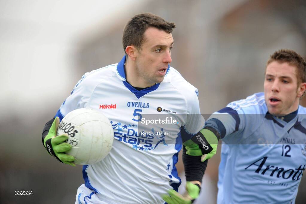 1 January 2009; Brian Sexton, Dub Stars, in action against Alan Hubbard, Dublin. Football Challenge Game, Dublin v Dub Stars, Páirc Barróg, Kilbarrack, Dublin. Picture credit: David Maher / SPORTSFILE