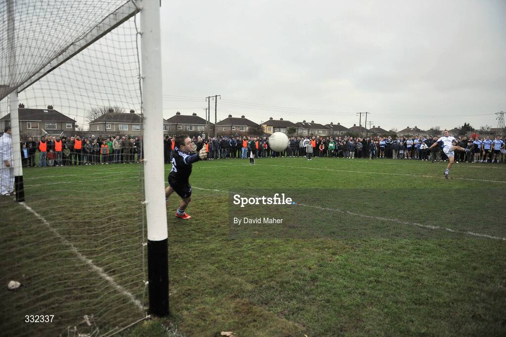 1 January 2009; Tomas Quinn, Dub Stars, takes a penalty kick during the penalty shoot-out against Dublin goalkeeper Thomas McGrath, at the end of the game. Football Challenge Game, Dublin v Dub Stars, Páirc Barróg, Kilbarrack, Dublin. Picture credit: David Maher / SPORTSFILE