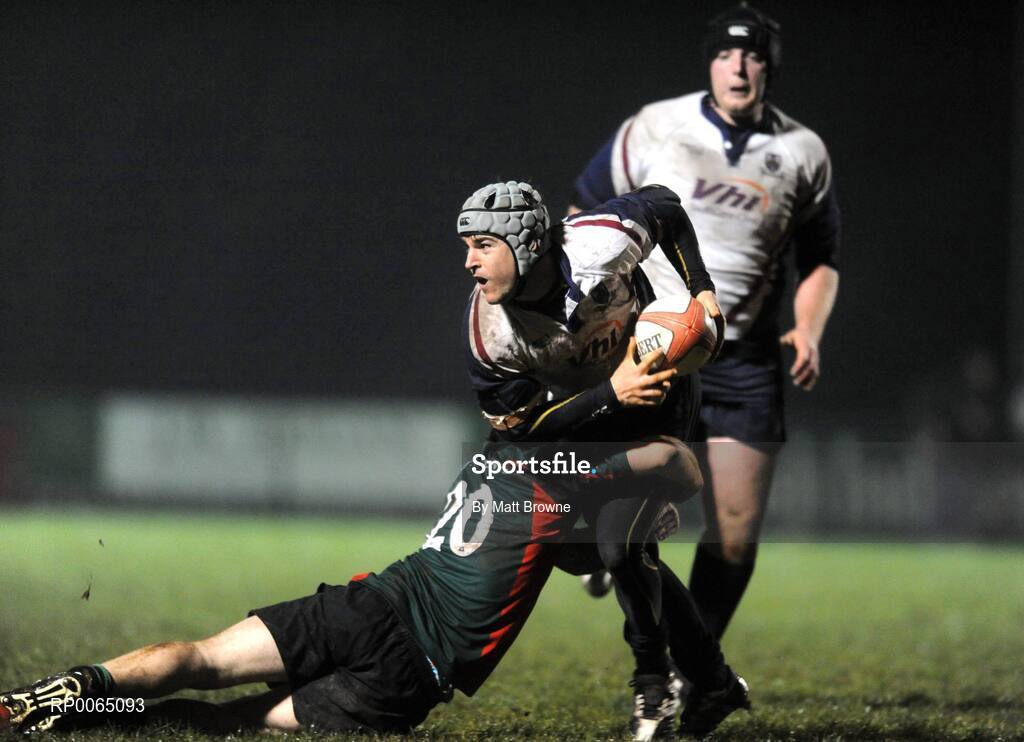 19 December 2008; Beaumont Hospital Rugby Team sponsored by Vhi SwiftCare Clinics raise the Hospitals Cup for the 2nd time in a row! Luke Dan, Beaumont Hospital, is tackled by Michael Boland, St Vincents Hospital. Dublin Hospitals Cup Final, Beaumont Hosptial v St Vincents University Hospital, Old Belvedere RFC, Anglesea Road, Dublin. Picture credit: Matt Browne / SPORTSFILE