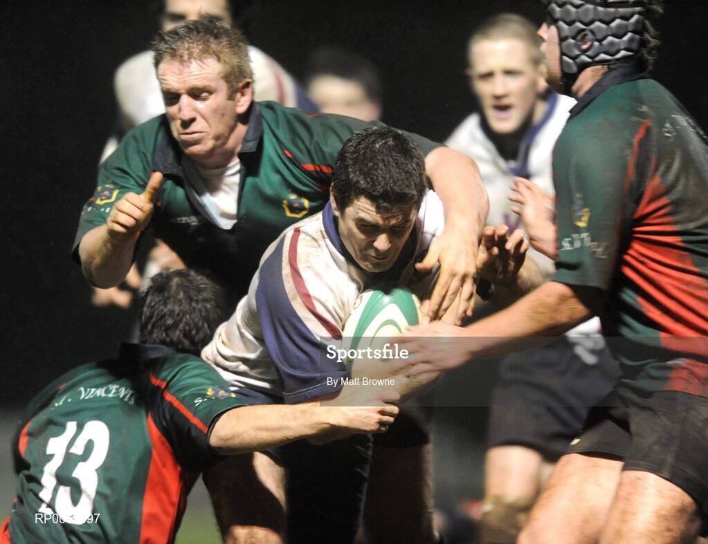 19 December 2008; Beaumont Hospital Rugby Team sponsored by Vhi SwiftCare Clinics raise the Hospitals Cup for the 2nd time in a row! Vincent Patton, Beaumont Hospital, is tackled by James Lee, 13, Conor Mitchell and Nathan Wall, St Vincents Hospital. Dublin Hospitals Cup Final, Beaumont Hosptial v St Vincents University Hospital, Old Belvedere RFC, Anglesea Road, Dublin. Picture credit: Matt Browne / SPORTSFILE