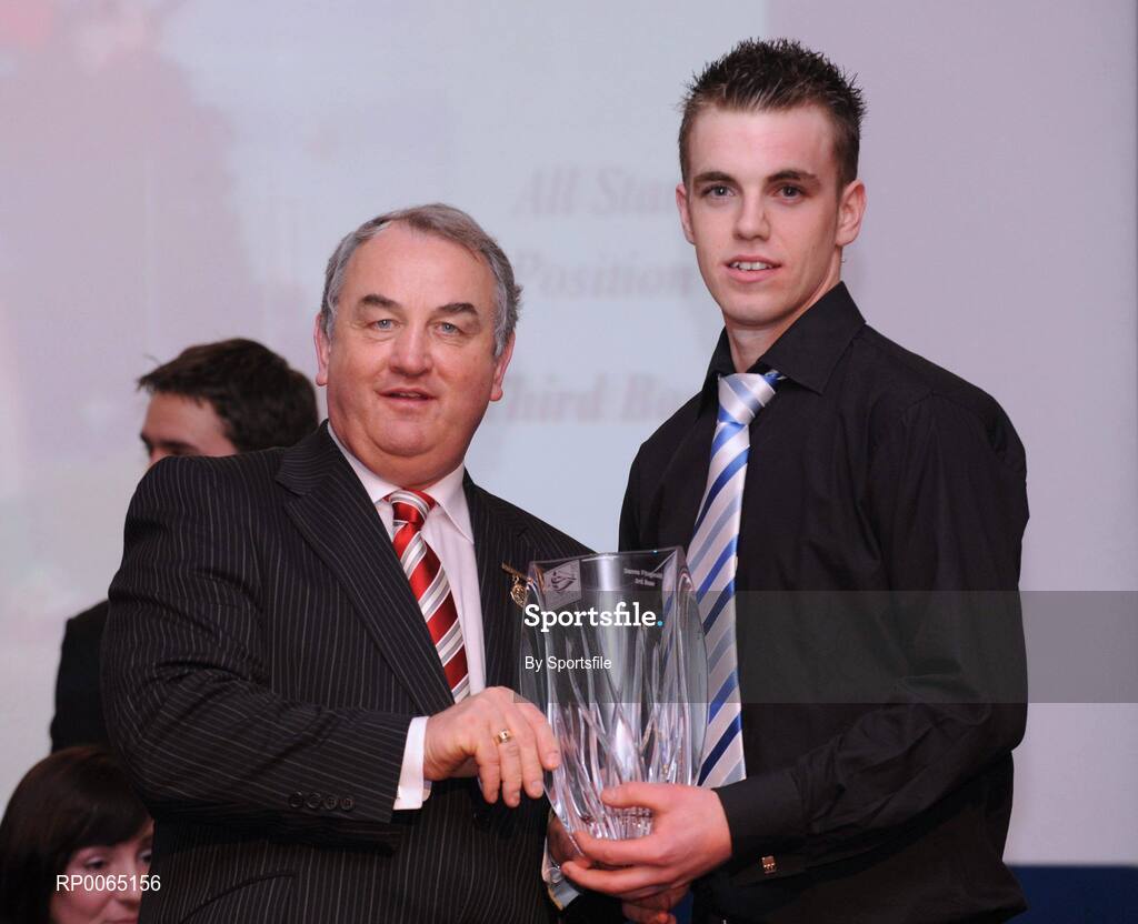 19 December 2008; Darren Fitzgerald, Cuchulainn, Carlow, is presented with his National GAA Rounders All Star award  by GAA President Nickey Brennan at the 2008 Christy Ring / Nicky Rackard Champion 15 & Rounders All Star Awards. Croke Park, Dublin. Photo by Sportsfile