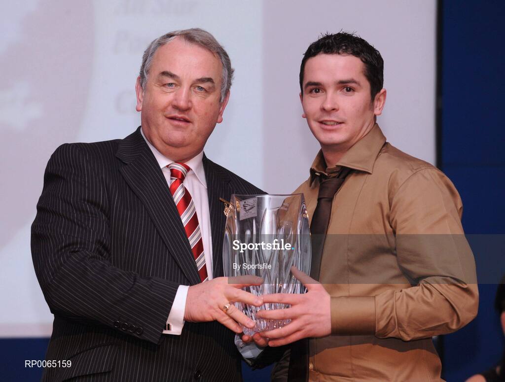 19 December 2008; PJ Kelly, St. Claire's, Cavan, is presented with his National GAA Rounders All Star award  by GAA President Nickey Brennan at the 2008 Christy Ring / Nicky Rackard Champion 15 & Rounders All Star Awards. Croke Park, Dublin. Photo by Sportsfile