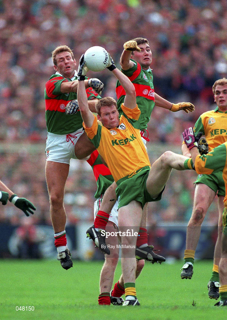 29 September 1996; Jimmy McGuinness, Meath wins the ball from Colm McManaman, left, and James Horan, Mayo, Meath v Mayo, All-Ireland Football Final replay, Croke Park, Co. Dublin. Picture credit; Ray McManus/SPORTSFILE