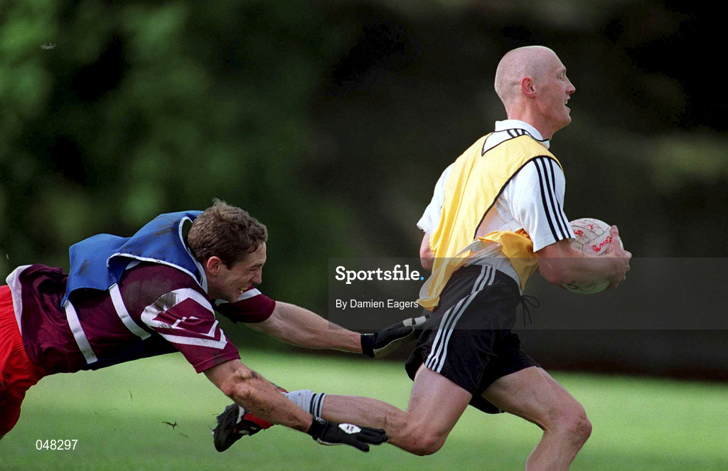 30 September 2000; Graham Geraghty, right, in action against Kieran McGeeney during an Ireland International Rules squad training session at St Patrick's College in Dublin. Photo by Damien Eagers/Sportsfile