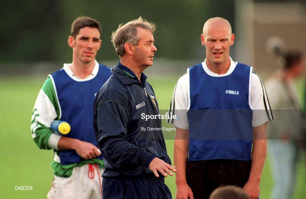30 September 2000; Manager Brian McEniff, centre, speaks with his players including Anthony Rainbow, left, and Graham Geraghty during an Ireland International Rules squad training session at St Patrick's College in Dublin. Photo by Damien Eagers/Sportsfile