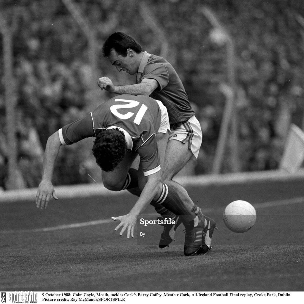 9 October 1988; Colm Coyle, Meath, tackles Cork's Barry Coffey. Meath v Cork, All-Ireland Football Final replay, Croke Park, Dublin. Picture credit; Ray McManus/SPORTSFILE