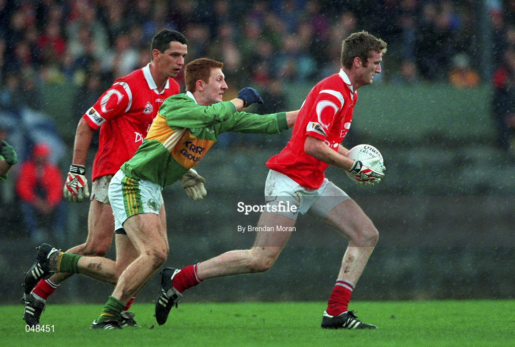 30 October 1999; Nicholas Murphy of Cork makes a break during the Church & General National Football League Division 1A Round 1 match between Cork and Kerry at Páirc Uí Rinn in Cork. Photo by Brendan Moran/Sportsfile