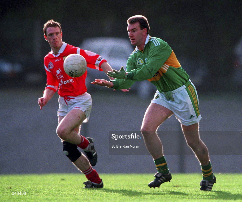 30 October 1999; Mike Hassett of Kerry in action against Philip Clifford of Cork during the Church & General National Football League Division 1A Round 1 match between Cork and Kerry at Páirc Uí Rinn in Cork. Photo by Brendan Moran/Sportsfile