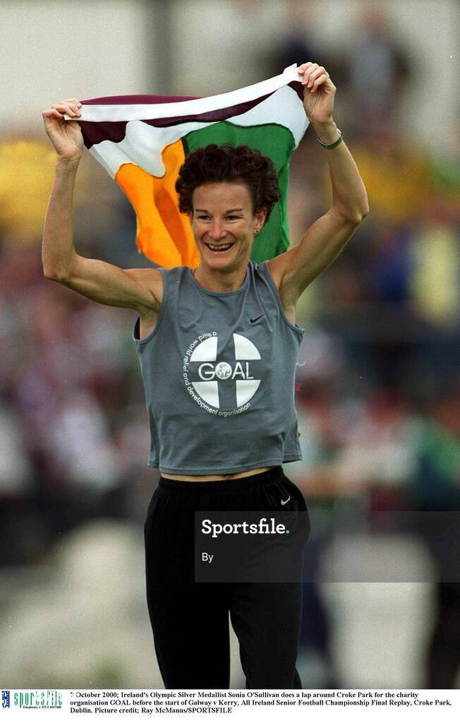 7 October 2000; Ireland's Olympic Silver Medallist Sonia O'Sullivan does a lap around Croke Park for the charity organisation GOAL before the start of Galway v Kerry, All Ireland Senior Football Championship Final Replay, Croke Park, Dublin. Picture credit; Ray McManus/SPORTSFILE