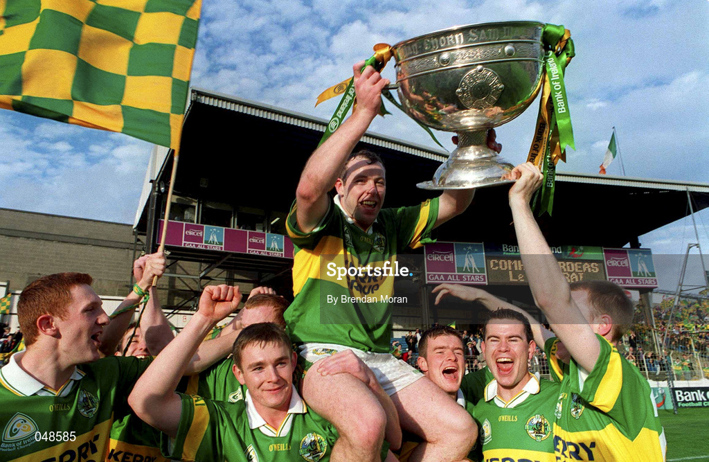 7 October 2000; Seamus Moynihan of Kerry is lifted by team-mates with the Sam Maguire cup following the Bank of Ireland All-Ireland Senior Football Championship Final Replay match between Kerry and Galway at Croke Park in Dublin. Photo by Brendan Moran/Sportsfile *** Local Caption *** 7 October 2000; during the Bank of Ireland All-Ireland Senior Football Championship Final Replay match between Kerry and Galway at Croke Park in Dublin. Photo by Brendan Moran/Sportsfile