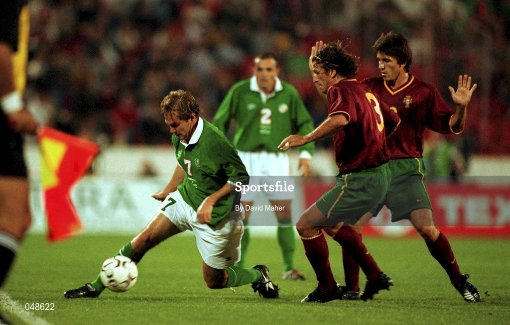 7 October 2000; Jason McAteer of Republic of Ireland in action against Dimas of Portugal during the World Cup 2002 Qualification Group 2 match between Portugal and Republic of Ireland at the Estádio da Luz in Lisbon, Portugal. Photo by David Maher/Sportsfile