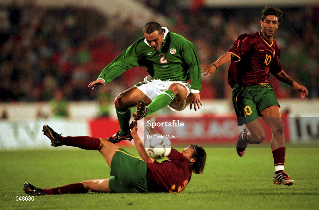 7 October 2000; Stephen Carr of Republic of Ireland evades the tackle from Dimas, bottom, and Rui Costa of Portugal during the World Cup 2002 Qualification Group 2 match between Portugal and Republic of Ireland at the Estádio da Luz in Lisbon, Portugal. Photo by David Maher/Sportsfile