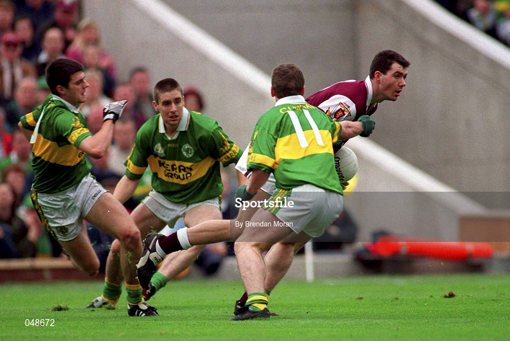 7 October 2000; Sean O'Domhnaill of Galway in action against, from left, Kerry players, Aodan MacGearailt, Darragh O'Sea and Dara O'Cinneide during the Bank of Ireland All-Ireland Senior Football Championship Final Replay match between Kerry and Galway at Croke Park in Dublin. Photo by Brendan Moran/Sportsfile
