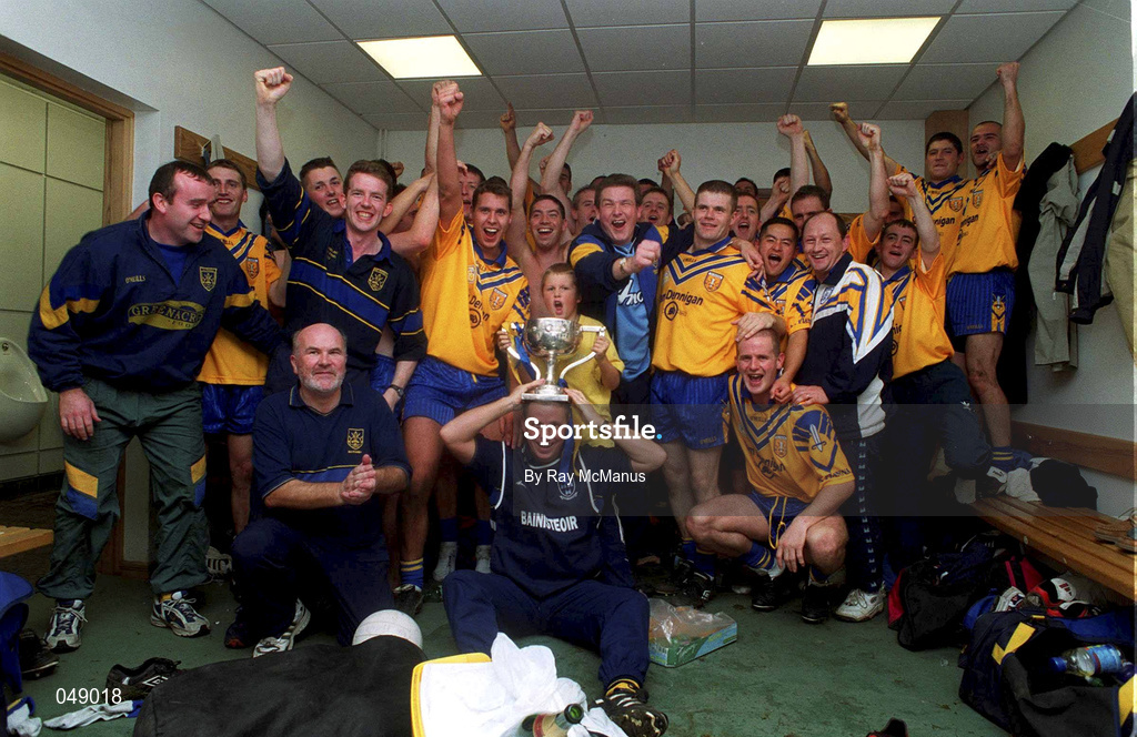 14 October 2000; Na Fianna players and staff celebrate following the Evening Herald Dublin Senior Football Championship Final match between Na Fianna and Kilmacud Crokes at Parnell Park in Dublin. Photo by Ray McManus/Sportsfile