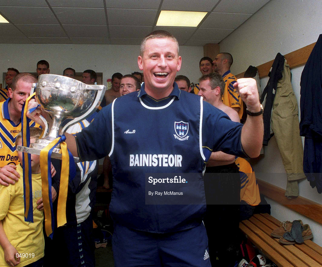 14 October 2000; Na Fianna manager Paul 'Pillar' Caffrey celebrates with the cup following the Evening Herald Dublin Senior Football Championship Final match between Na Fianna and Kilmacud Crokes at Parnell Park in Dublin. Photo by Ray McManus/Sportsfile