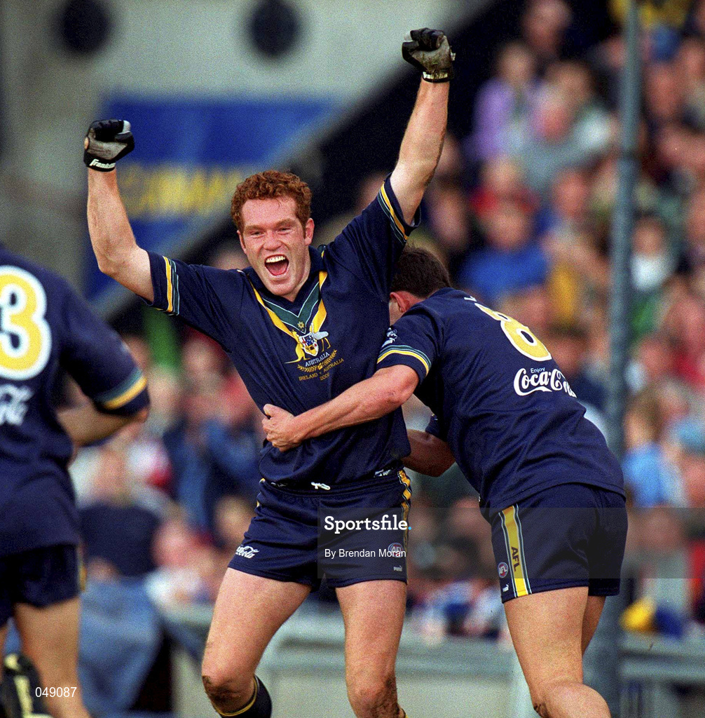 15 October 2000; Justin Leppitsch, left, of Australia celebrates with team-mate Brett Ratten after scoring his side's first goal during the International Rules Series Second Test match between Ireland and Australia at Croke Park in Dublin. Photo by Brendan Moran/Sportsfile