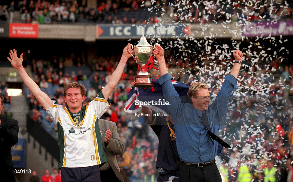 15 October 2000; Australia captain James Hird, left, and manager Dermot Brereton lift the cup following the International Rules Series Second Test match between Ireland and Australia at Croke Park in Dublin. Photo by Brendan Moran/Sportsfile