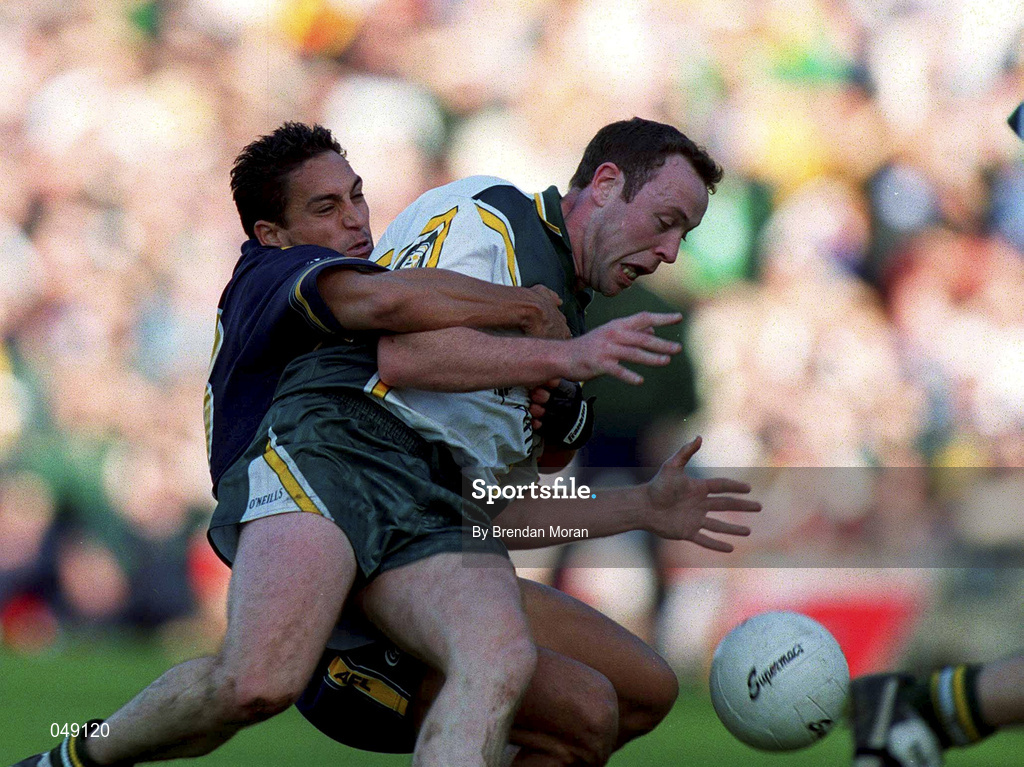 15 October 2000; Seamus Moynihan of Ireland in action against Andrew McLeod of Australia during the International Rules Series Second Test match between Ireland and Australia at Croke Park in Dublin. Photo by Brendan Moran/Sportsfile