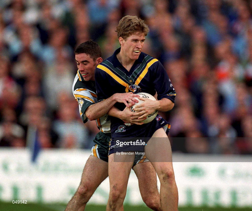 15 October 2000; Luke Power of Australia in action against Anthony Rainbow of Ireland during the International Rules Series Second Test match between Ireland and Australia at Croke Park in Dublin. Photo by Brendan Moran/Sportsfile
