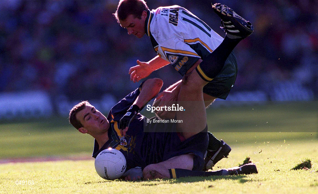 15 October 2000; Darren Fey of Ireland in action against Steven King of Australia during the International Rules Series Second Test match between Ireland and Australia at Croke Park in Dublin. Photo by Brendan Moran/Sportsfile