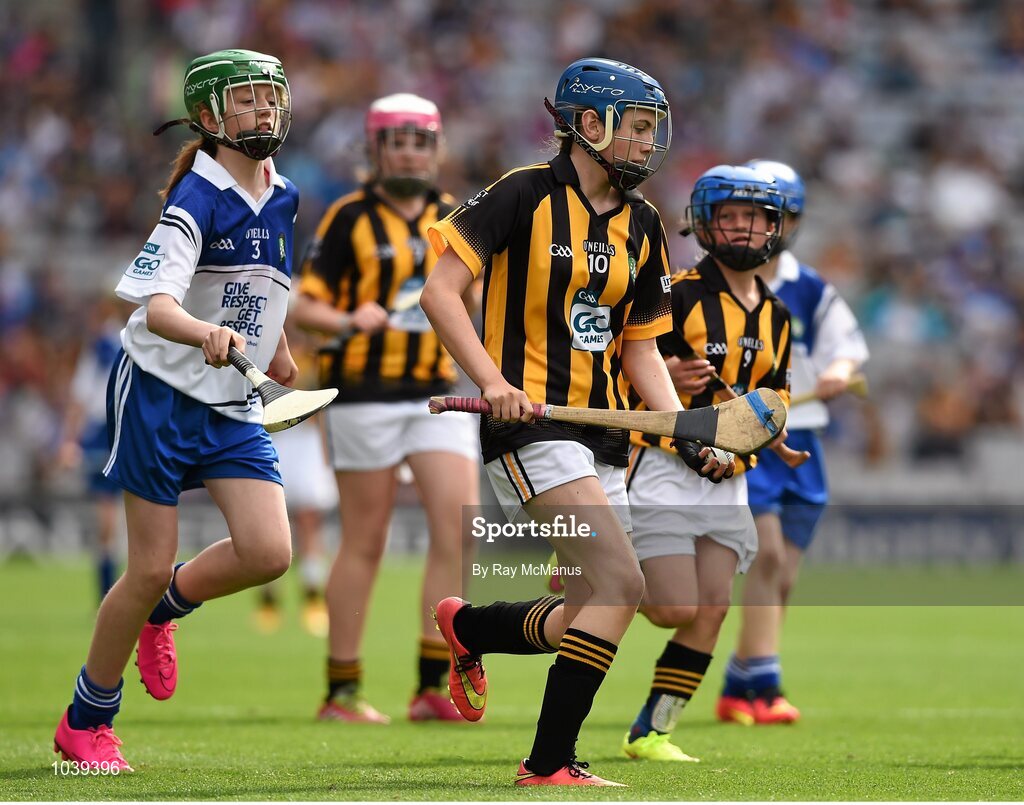 9 August 2015; Katie Quinlivan, Loreto PS, Rathfarnham, Dublin 14, representing Kilkenny, in action against Lucy O’Kane, St Johns PS, Coleraine, Derry, representing Waterford, during the Cumann na mBunscol INTO Respect Exhibition Go Games 2015 at Kilkenny v Waterford - GAA Hurling All-Ireland Senior Championship Semi-Final. Croke Park, Dublin. Picture credit: Ray McManus / SPORTSFILE