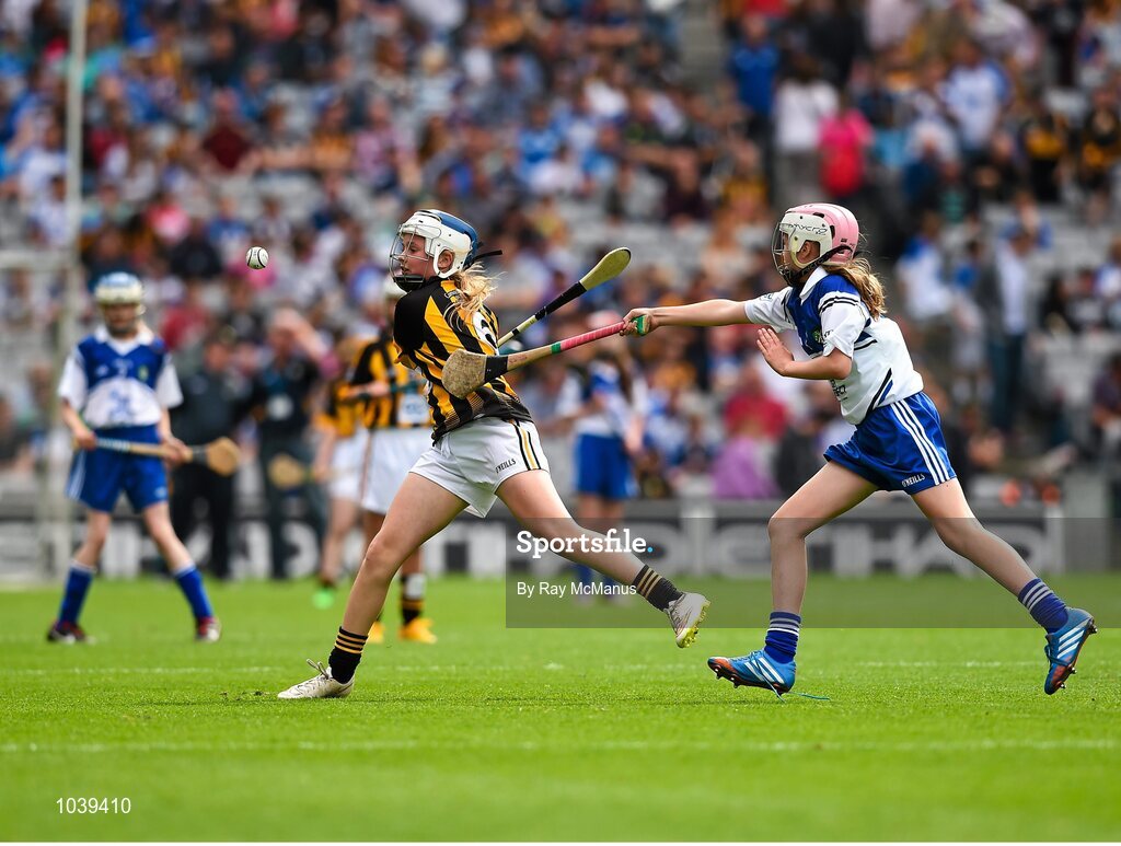 9 August 2015; Fianna Byrne, Killanure NS, Mountrath, Laois, representing Kilkenny, in action against Gráinne O’Reilly, Emo NS, Portlaoise, Laois, representing Waterford, during the Cumann na mBunscol INTO Respect Exhibition Go Games 2015 at Kilkenny v Waterford - GAA Hurling All-Ireland Senior Championship Semi-Final. Croke Park, Dublin. Picture credit: Ray McManus / SPORTSFILE