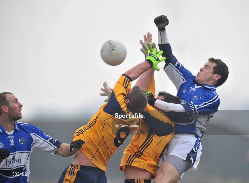 4 January 2009; Padraig McMahon, Laois, in action against Ray Cullivan, 9 and Rory Maguire, DCU. O'Byrne Cup, First Round, Laois v DCU, McCann Park, Portarlington, Co. Laois. Picture credit: David Maher / SPORTSFILE