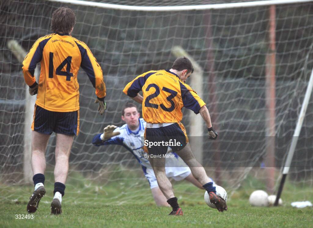 4 January 2009; Martin McIlroy, DCU, beats Laois goalkeeper Michael Nolan to score his side's first goal. O'Byrne Cup, First Round, Laois v DCU, McCann Park, Portarlington, Co. Laois. Picture credit: David Maher / SPORTSFILE