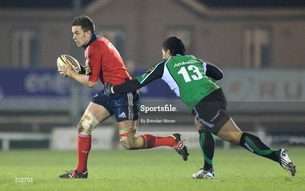 28 December 2008; Nialll Ronan, Munster, is tackled by Niva Ta'auso, Connacht. Magners League, Connacht v Munster, Sportsground, Galway. Picture credit: Brendan Moran / SPORTSFILE