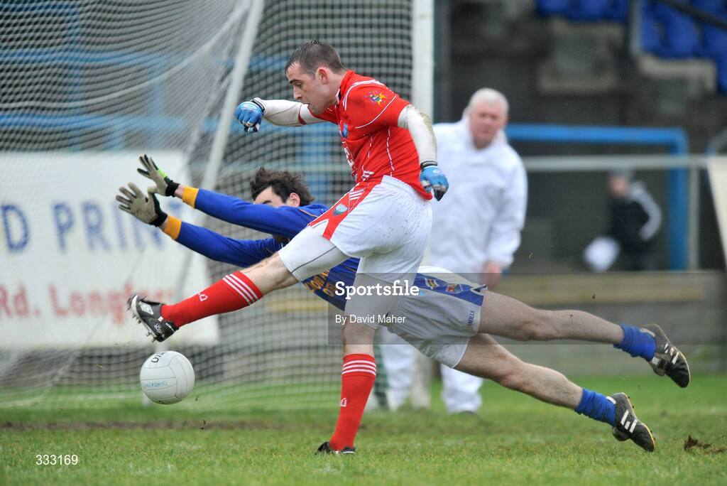 11 January 2009; Shane Lennon, Louth, scores his side's second goal despite the challange from Kevin Smith, Longford. O'Byrne Cup Quarter-Final, Longford v Louth, Pearse Park, Longford. Picture credit: David Maher / SPORTSFILE