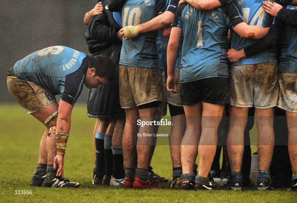 14 January 2009; Newpark's Eoin Gorman adjusts his boots during the half-time team talk. Leinster Schools Vinnie Murray Senior Cup First Round - Section B, Newpark v Wesley College, Kiltiernan, Co. Dublin. Picture credit: Brian Lawless / SPORTSFILE