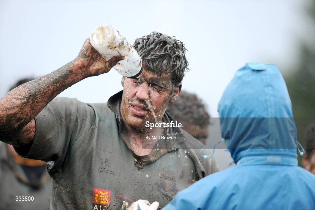 17 January 2009; Brian Cawley, UCD, washes mud from his eyes during the game against Clontarf. AIB League Division 1, Clontarf v UCD, Castle Avenue, Clontarf, Dublin. Picture credit: Matt Browne / SPORTSFILE