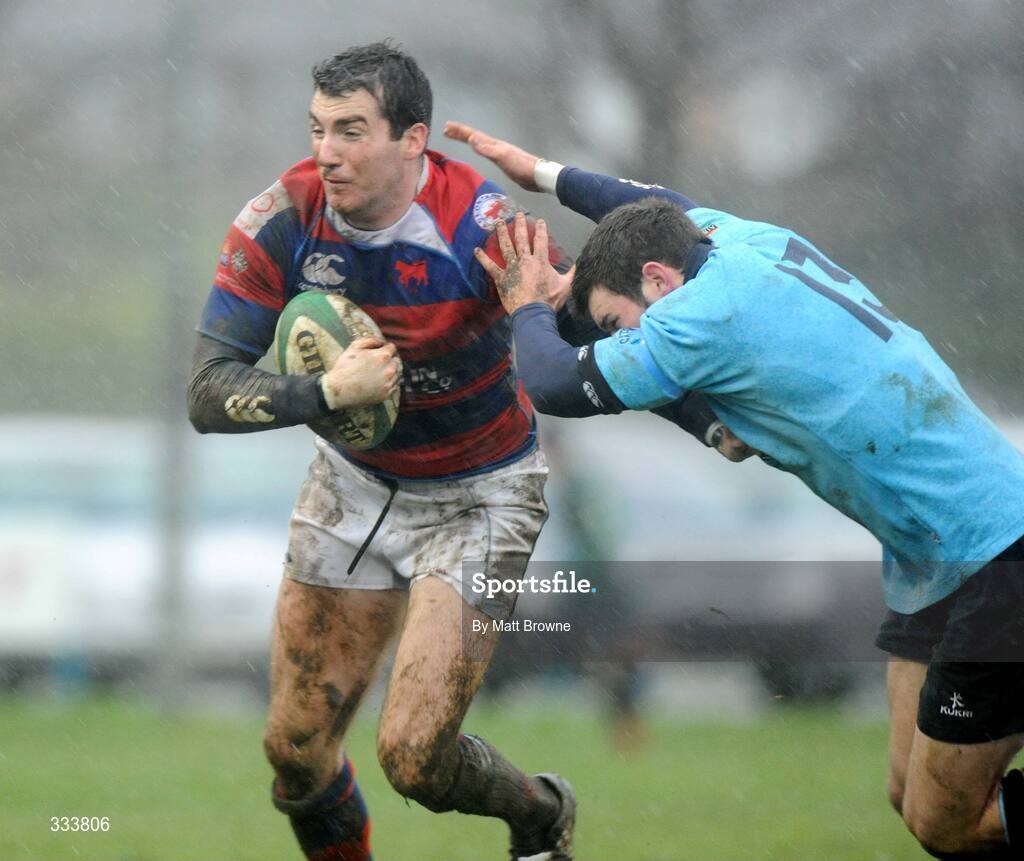 17 January 2009; Peter O'Brien, Clontarf, is tackled by Fergus McFadden, UCD. AIB League Division 1, Clontarf v UCD, Castle Avenue, Clontarf, Dublin. Picture credit: Matt Browne / SPORTSFILE