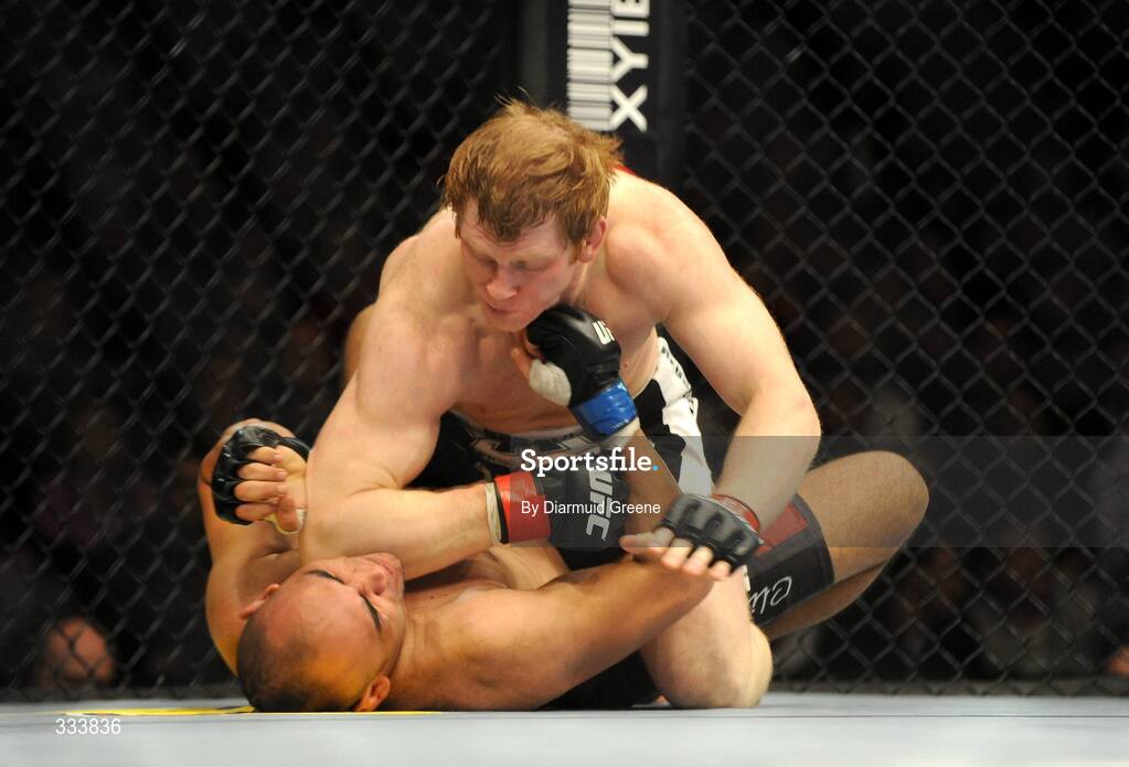 17 January 2009; Eric "Ravishing Red" Schafer, top, lands an elbow on the chin of Antonio "Sumuray" Mendes during their light heavyweight bout. UFC 93, Ultimate Fighting Championship, The O2, Dublin. Picture credit: Diarmuid Greene / SPORTSFILE