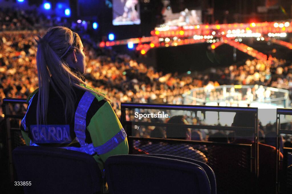 17 January 2009; A member of An Garda Síochána watches over the crowd. UFC 93, Ultimate Fighting Championship, The O2, Dublin. Picture credit: Diarmuid Greene / SPORTSFILE