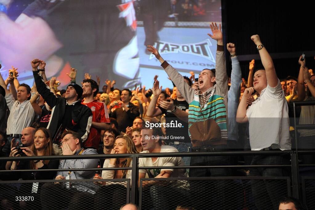 17 January 2009; Fans celebrate as Marcus "The Irish Hand Grenade" Davis is awarded his bout against Chris "Lights Out" Lytle by a split decision after their welterweight bout. UFC 93, Ultimate Fighting Championship, The O2, Dublin. Picture credit: Diarmuid Greene / SPORTSFILE