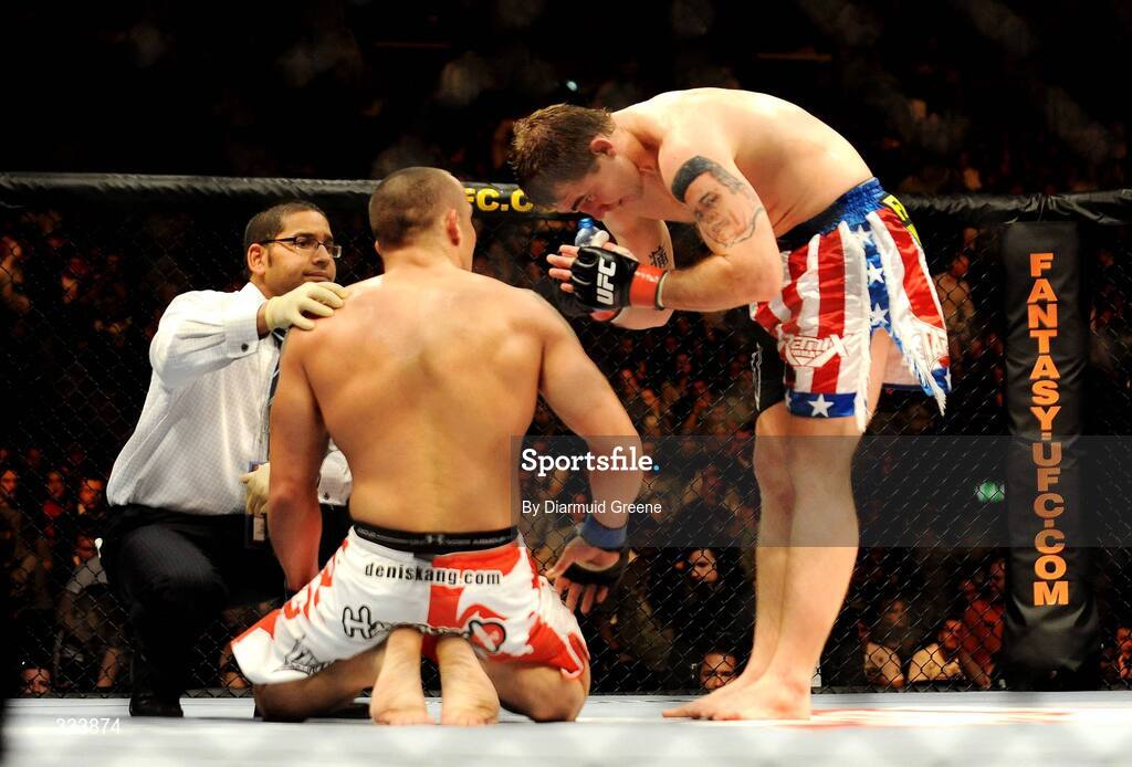 17 January 2009; Alan "The Talent" Belcher bows to Denis Kang after defeating him in their middleweight bout. UFC 93, Ultimate Fighting Championship, The O2, Dublin. Picture credit: Diarmuid Greene / SPORTSFILE