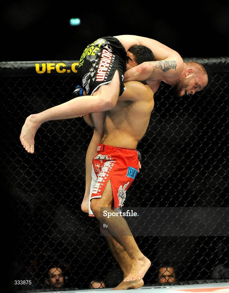 17 January 2009; Jeremy "Gumby" Horn is lifted up by Rousimar "Toquinho" Palhares during their middleweight bout. UFC 93, Ultimate Fighting Championship, The O2, Dublin. Picture credit: Diarmuid Greene / SPORTSFILE