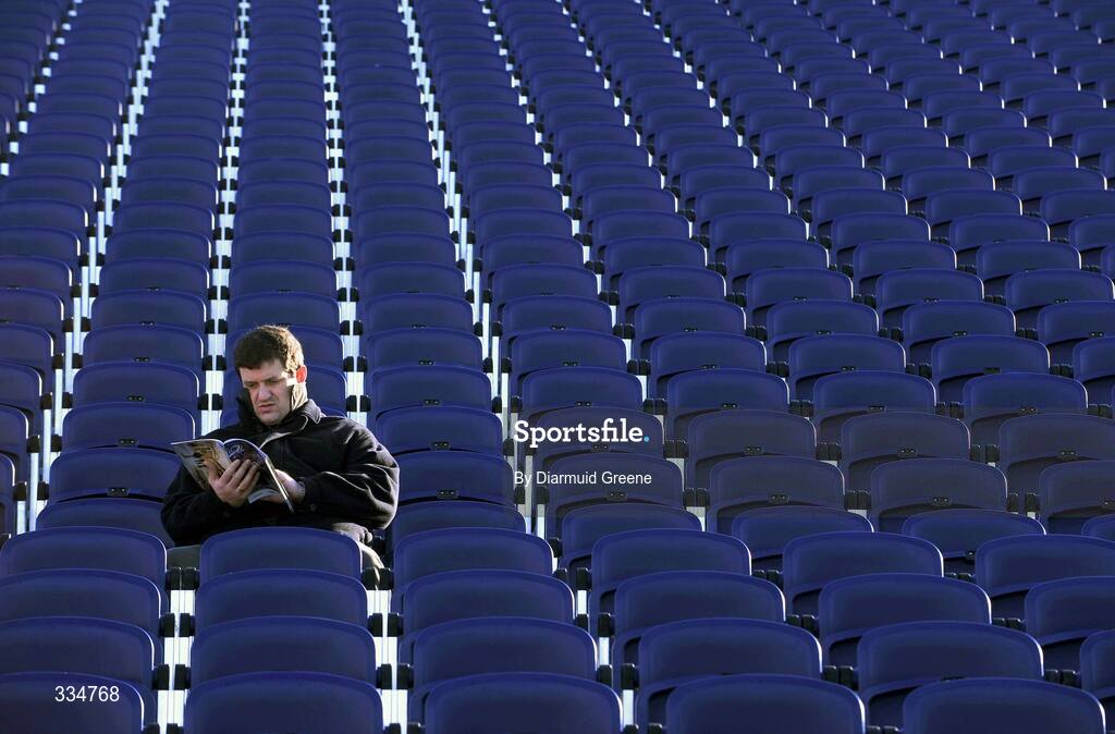 25 January 2009; Leinster supporter Ronan Egan, from Portobello, Dublin, reads the match programme ahead of the game. Heineken Cup, Pool 2, Round 6, Leinster v Edinburgh, RDS, Dublin. Picture credit: Diarmuid Greene / SPORTSFILE