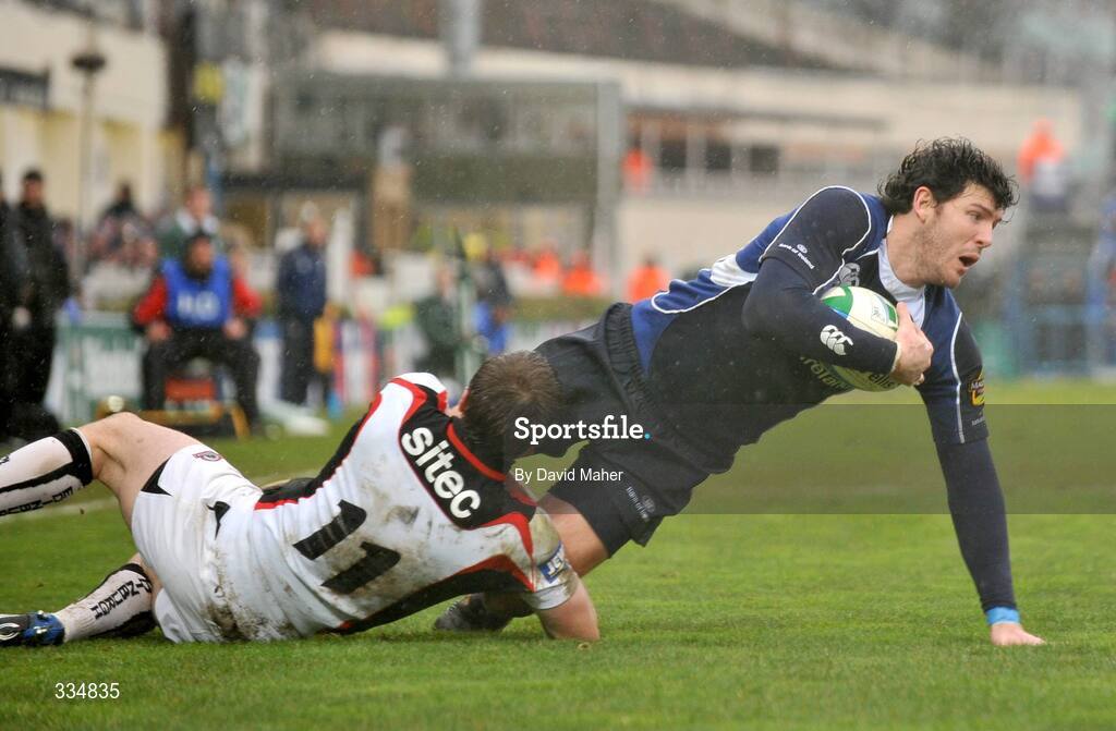 25 January 2009; Shane Horgan, Leinster, is tackled by Simon Webster, Edinburgh. Heineken Cup, Pool 2, Round 6, Leinster v Edinburgh, RDS, Dublin. Picture credit: David Maher / SPORTSFILE